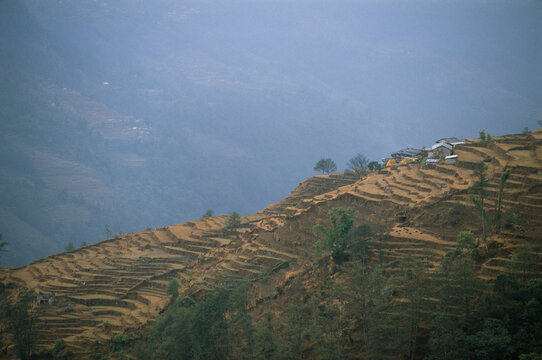 Farm houses and terraced fields in Anapurna Region, Nepal.