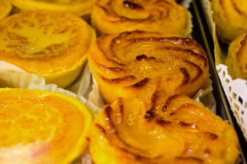 Baked sweet desserts cakes on display in balery in Lisbon, Portugal