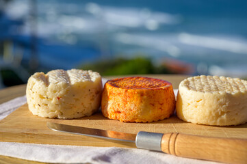 Variety of goat, sheep, cow cheeses made with paprika, herbs in Portugal