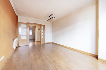 Empty room with oak wooden double door with glass and two-color smooth walls