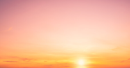 Sunset sky clouds in the morning with pink, yellow, orange sunlight romantic sky background 