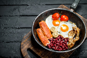 Traditional English Breakfast in a pan.