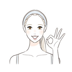 笑顔でOKサインする女性　スキンケア