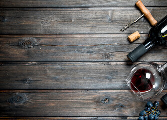 Wine background. Red wine with grapes.