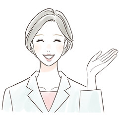 笑顔で案内する白衣の女性