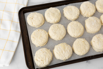 Raw Homemade Buttermilk Biscuits on Baking Sheet