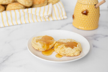 Close-up of Freshly Baked Homemade Buttermilk Biscuits with Honey