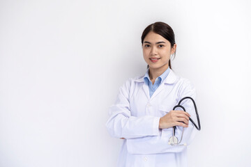 Portrait of female doctor in medical coat standing on isolated white background