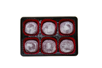 mochi cakes.Japanese traditional dessert on white background. Berry mochi in powdered sugar isolated on white background. 
