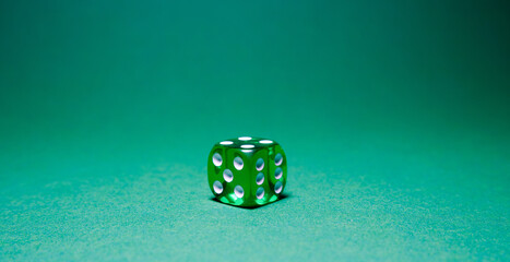 green dice on a green table