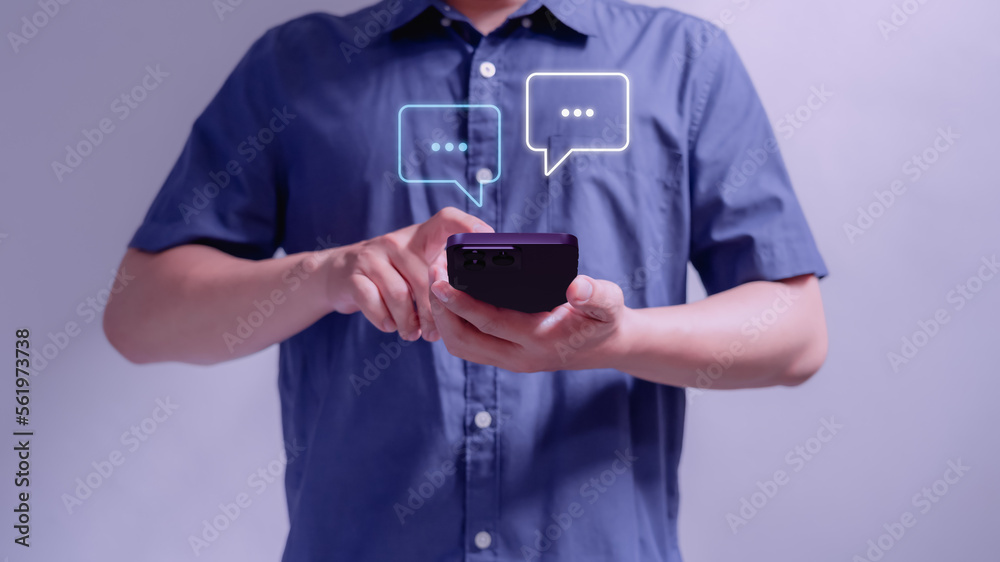 Poster Man hand using smartphone typing live chat chatting on application communication digital web and social network concept. Social media application chat box.