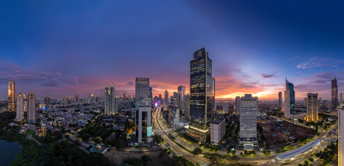 Fototapeta na wymiar Jakarta Panoramic from Sudirman street view during the golden hour. Jakarta is capital city of indonesia before it be moved to Kalimantan. 