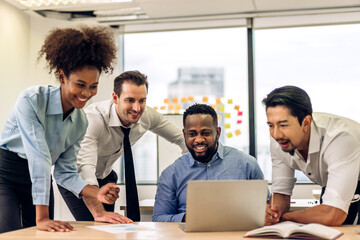 Group of business meeting and discussing strategy with startup project analysis finance process.Success business people plan and brainstorm marketing idea with computer and document in office.Teamwork