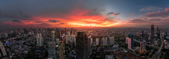 Jakarta Panoramic from Sudirman street view during the golden hour. Jakarta is capital city of...