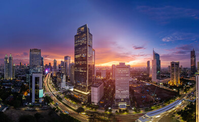 Fototapeta na wymiar Jakarta Panoramic from Sudirman street view during the golden hour. Jakarta is capital city of indonesia before it be moved to Kalimantan.