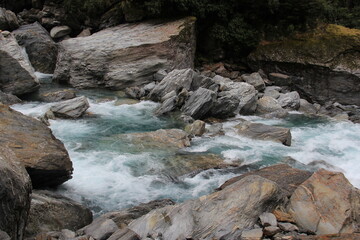 rushing river over boulders in New Zealand