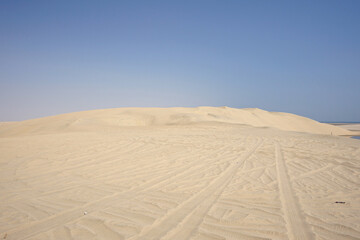 Beautiful sand dune landscape with blue sky in desert