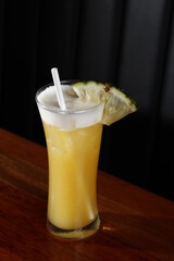 Pineapple drink in a tall glass