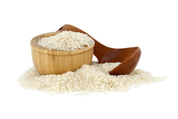 Long-grain rice in wooden bowl and wooden spoon