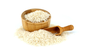 Long-grain rice in wooden bowl and wooden scoop