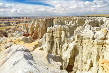 Fototapeta premium Stunning view of white striped sandstone hoodoos in Coal Mine Canyon near Tuba city, Arizona, USA.