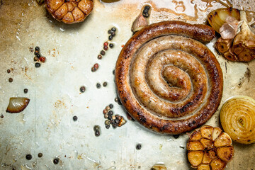 Fried sausages with garlic and onions.