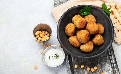 Chickpeas falafel with pita,sauce. Top view