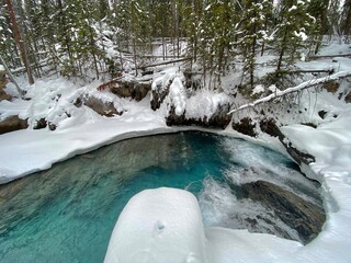 waterfall in the mountains in winter