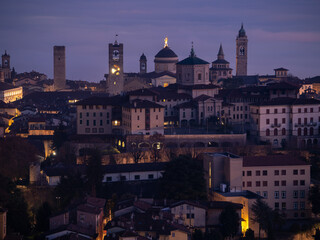 Bergamo. One of the beautiful city in Italy. Landscape at the old town from the hill at evening. Amazing view of the towers, bell towers and main churches. Touristic destination. Best of Italy