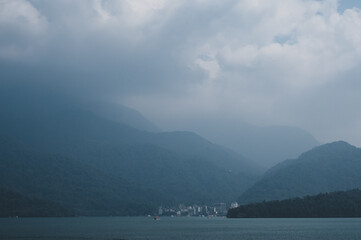 morning summer of nature mountain landscape in happy lifestyle of freedom and relax with cloud fog on sky, adventure travel journey vacation with sunrise or sunset over beautiful mist forest