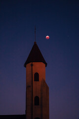 Total lunar eclipse and quiet rice fields