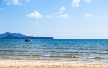 Peaceful sandy beach with clear blue sky and blue sea, troical beach in south of Thailand, summer holiday