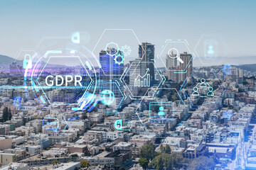 Panoramic cityscape view of San Francisco financial downtown at day time from rooftop, California, United States. GDPR hologram, concept of data protection regulation and privacy for all individuals