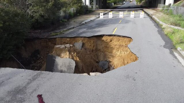 Cars Fall Down large Sink Hole