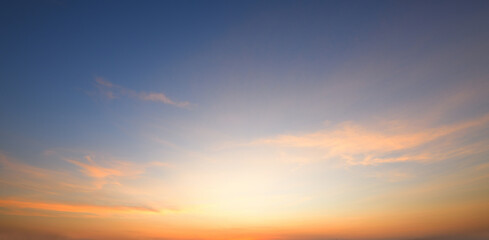 Panoramic view of dawn sky in country field.