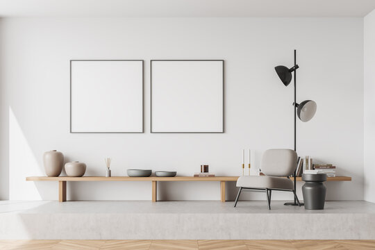Bright living room interior with two empty white poster