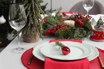 Luxury place setting with beautiful festive decor for Christmas dinner on white table, closeup