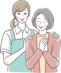 微笑む介護士とシニア女性
