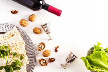festive Passover Jewish background. traditional objects and products on a white background. top view . copy space.
