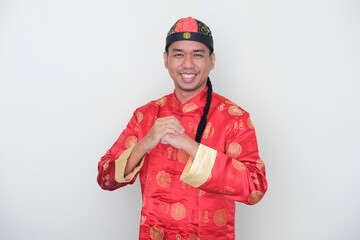 Asian man wearing Chinese costume celebrate new year