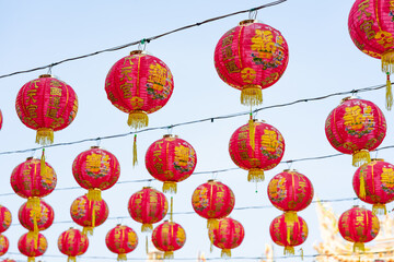 Fototapeta na wymiar Chinese new year lanterns in Chinese shrine at Thailand with the text 