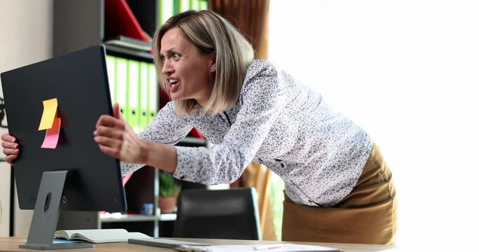 Shocked business woman looking at information on computer screen and screaming 4k movie slow motion 