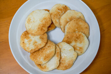 A plate of golden and delicious hand-made cuttlefish cake