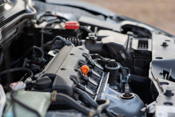 The environmentally friendly motor of a modern car is under the bonnet close-up.