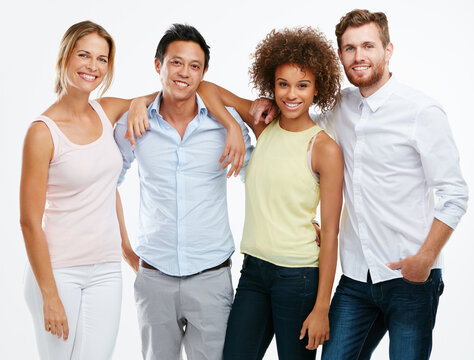 Diversity, People And Portrait Smile Of Friends Standing Together In Friendship Against White Studio Background. Isolated Diverse Group Smiling In For Unity, Community Or Profile On White Background