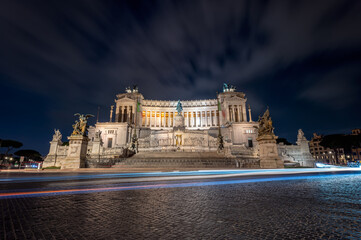 Fototapeta na wymiar A beautiful view of the illuminated building of Victor Emmanuel II National Monument in Rome at night
