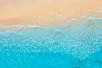 Türaufkleber Summer seascape beautiful waves, blue sea water in sunny day. Top view from drone. Sea aerial view, amazing tropical nature background. Beautiful bright sea with waves splashing and beach sand concept © icemanphotos