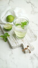 mojito drink on white table