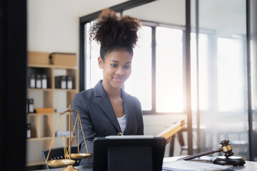 Lawyer business woman working with paperwork on his desk in office workplace for consultant lawyer in office.