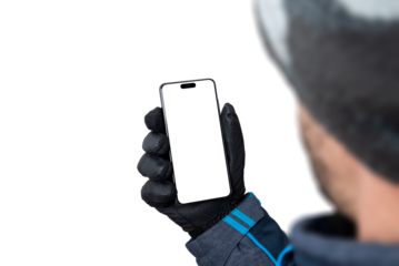 Winter phone mockup in man hand with jacket, gloves and hat. Isolated display and background for app presentation